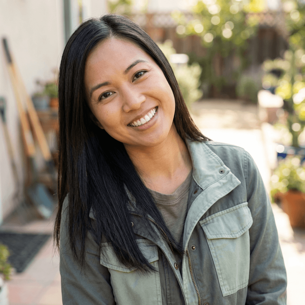 Portrait of an art guide smiling in a sunlit studio
